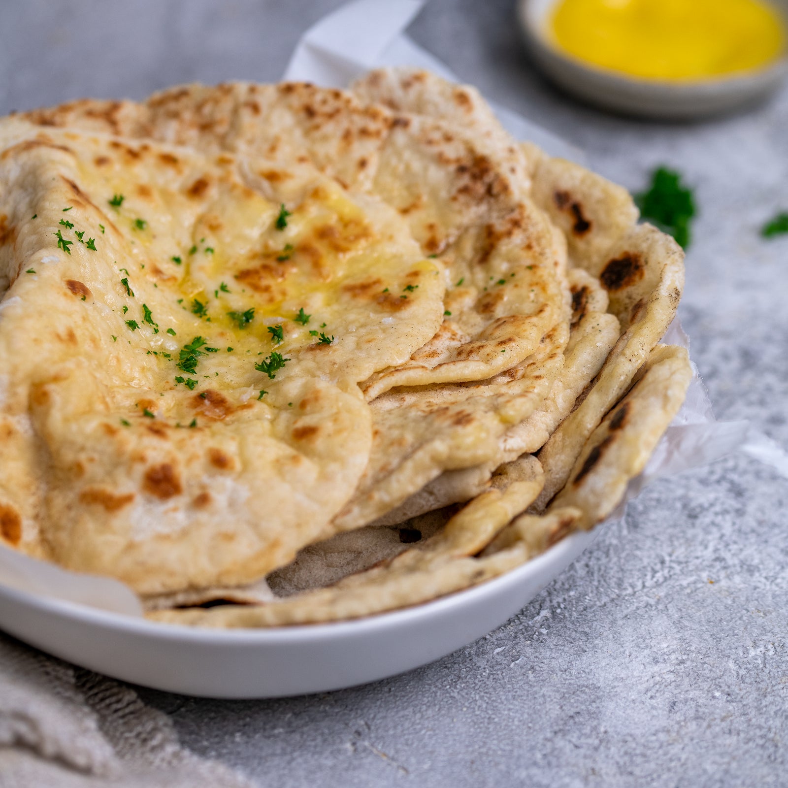 imafe of soft and fluffy 2-ingredient flatbread in a bowl