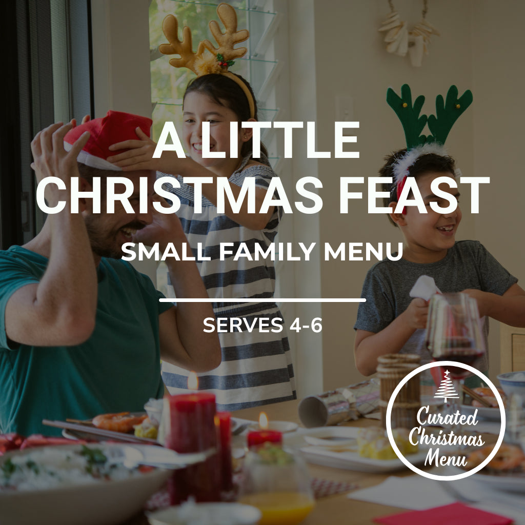 Family enjoying a Christmas meal with festive hats, text overlay about a Christmas feast menu.