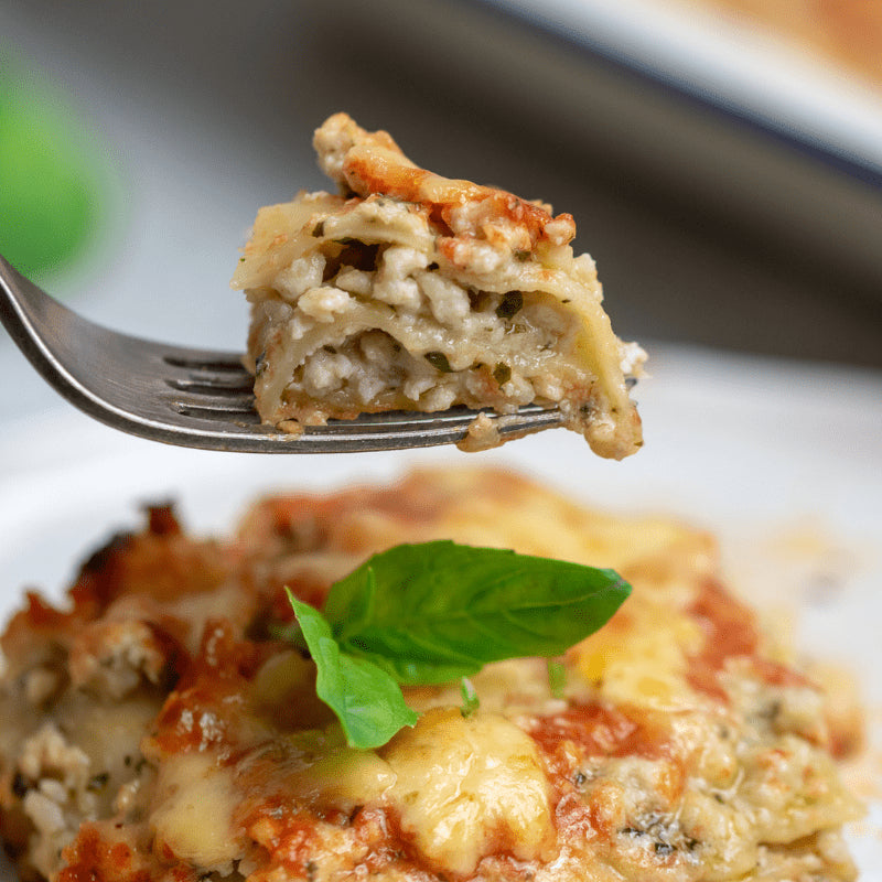 Image of Chicken Pesto Lasagne Closeup on a fork