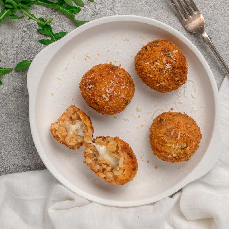 Image of Davide&#39;s Sicilian Arancini on a plate with cheese centre