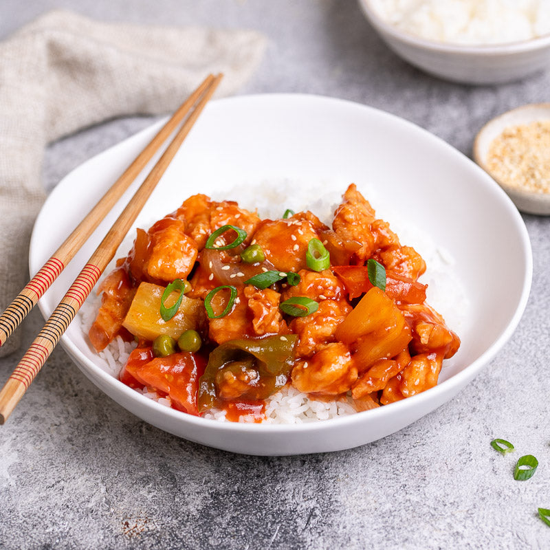 image of sweet and sour chicken with rice in a bowl