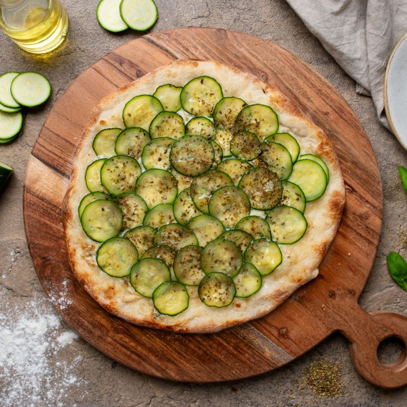 Top shot of zucchini and gorgonzola pizza by Simone, FoodSt 