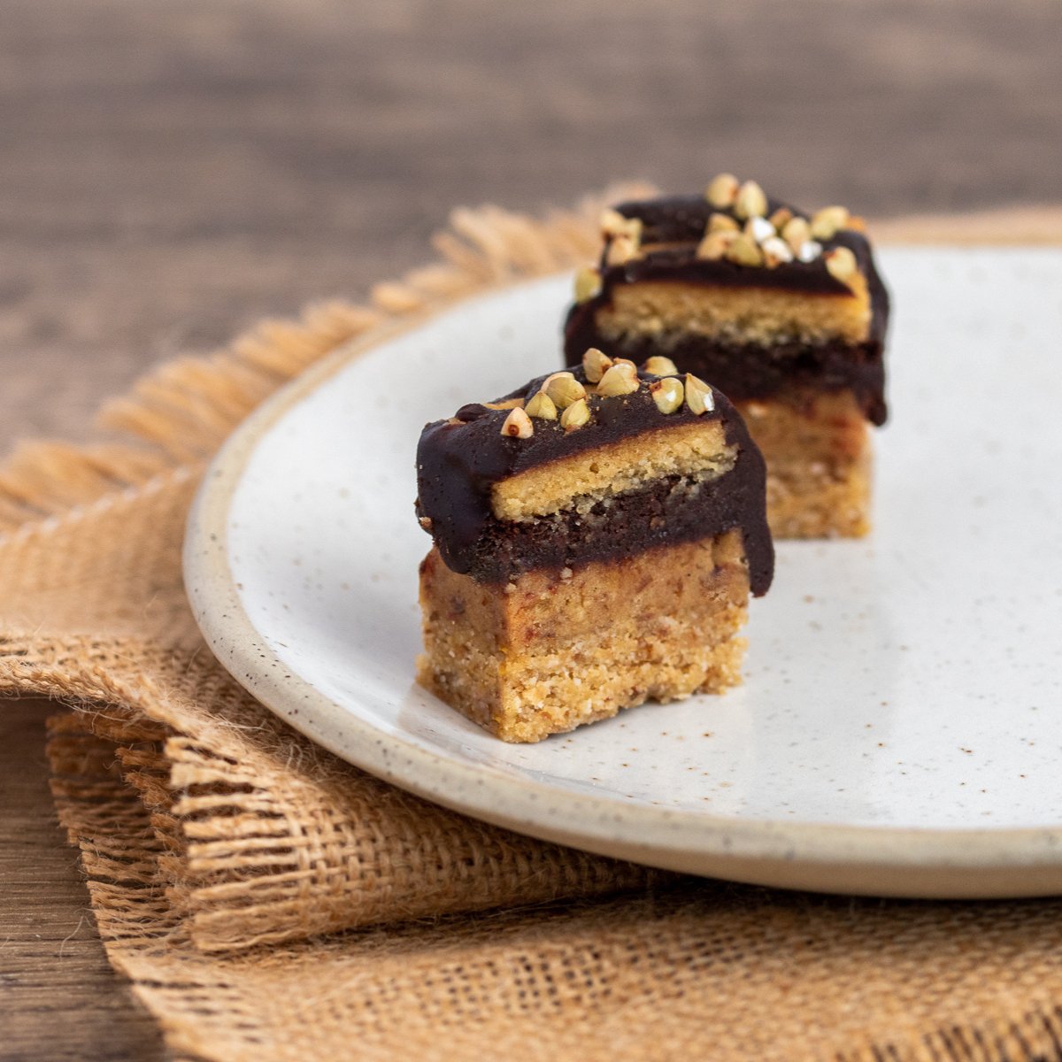 Amee&#39;s Gourmet Raw Chocolate and Peanut Butter Bars presented on a dish