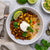 Close-up view of Ana's Mexican Bowl (V) featuring a mix of vegetables and legumes