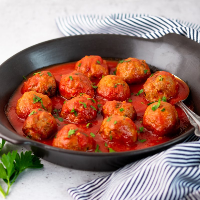 Ben&#39;s Italian Meatballs simmering in tomato sauce