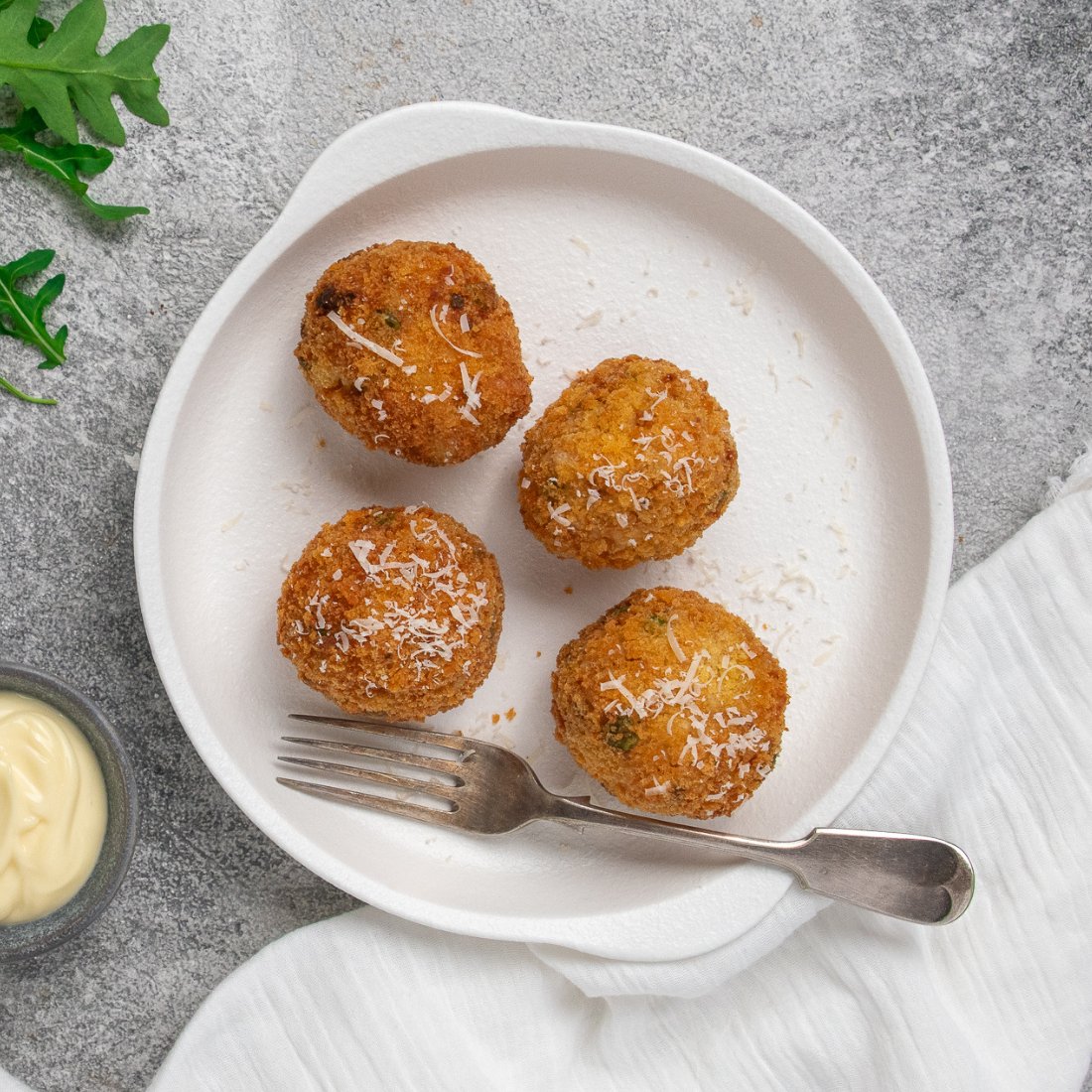 Davide&#39;s Arancini on a white plate