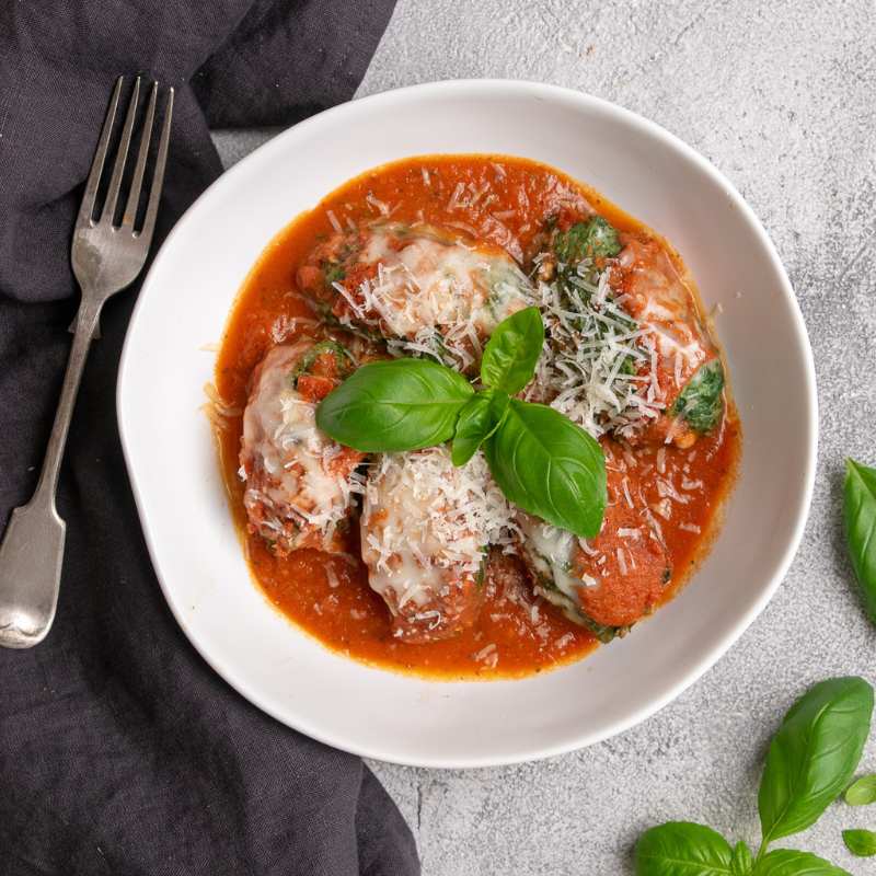 Flatlay image of Davide&#39;s Gnudi in tomato sugo 