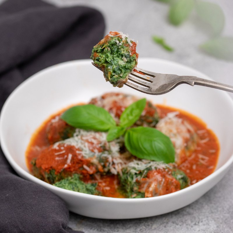 Davide&#39;s Italian Gnudi close up with a Gnudi on a fork