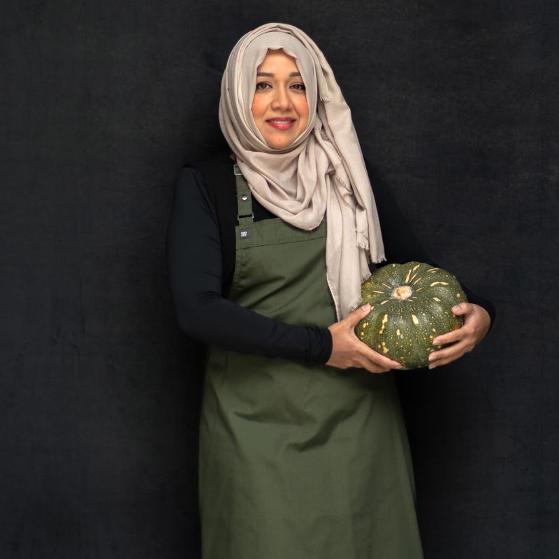 Portrait of Nasheet with a pumpkin